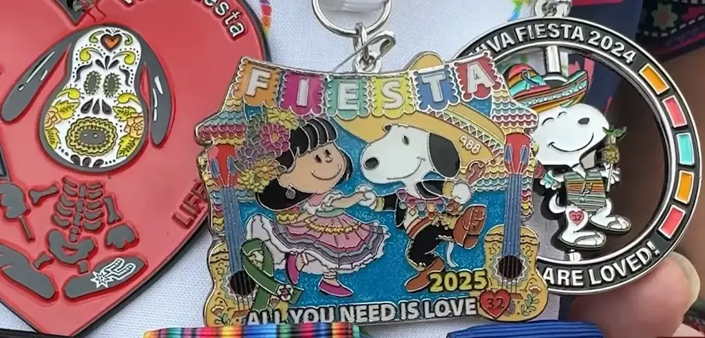 Colorful custom Fiesta medal featuring Snoopy and Peanuts characters with the text 