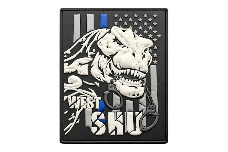 Police-themed morale patch with T-Rex, handcuffs, and Thin Blue Line design.