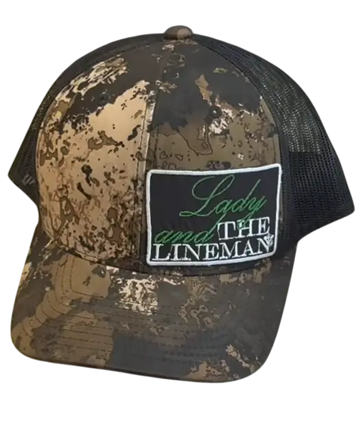 Camouflage trucker hat with embroidered patch reading Lady and the Lineman