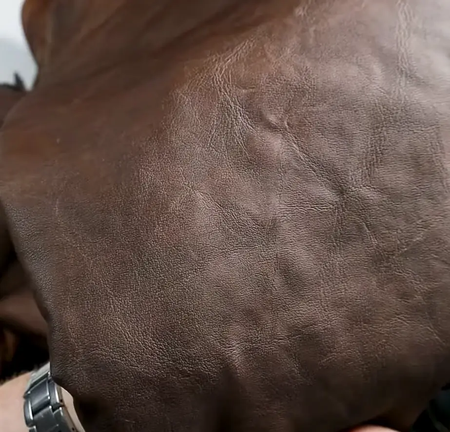 Close-up of faux leather with smooth, uniform surface and consistent synthetic texture