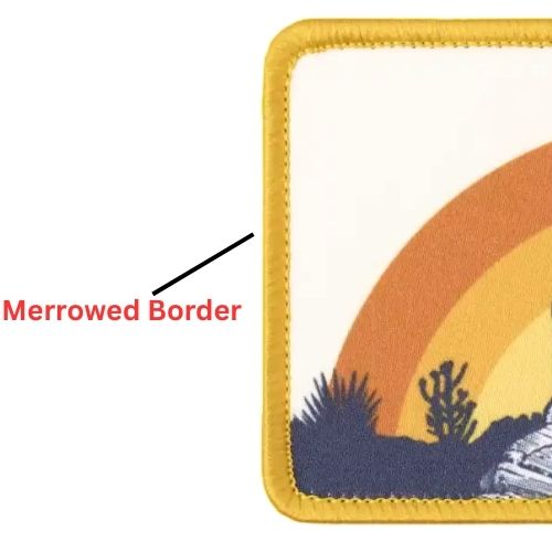 Rectangular printed patch with a yellow merrowed border showing a ram standing on rocks
