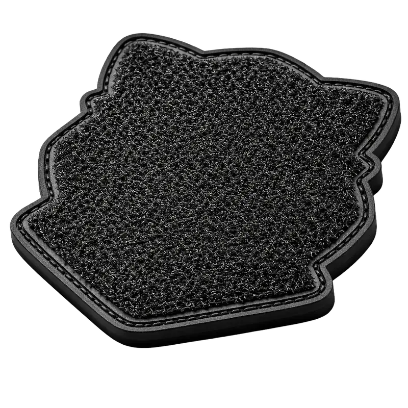 Reverse side of tactical patch featuring durable Velcro hook material for attachment to military gear and loop surfaces.